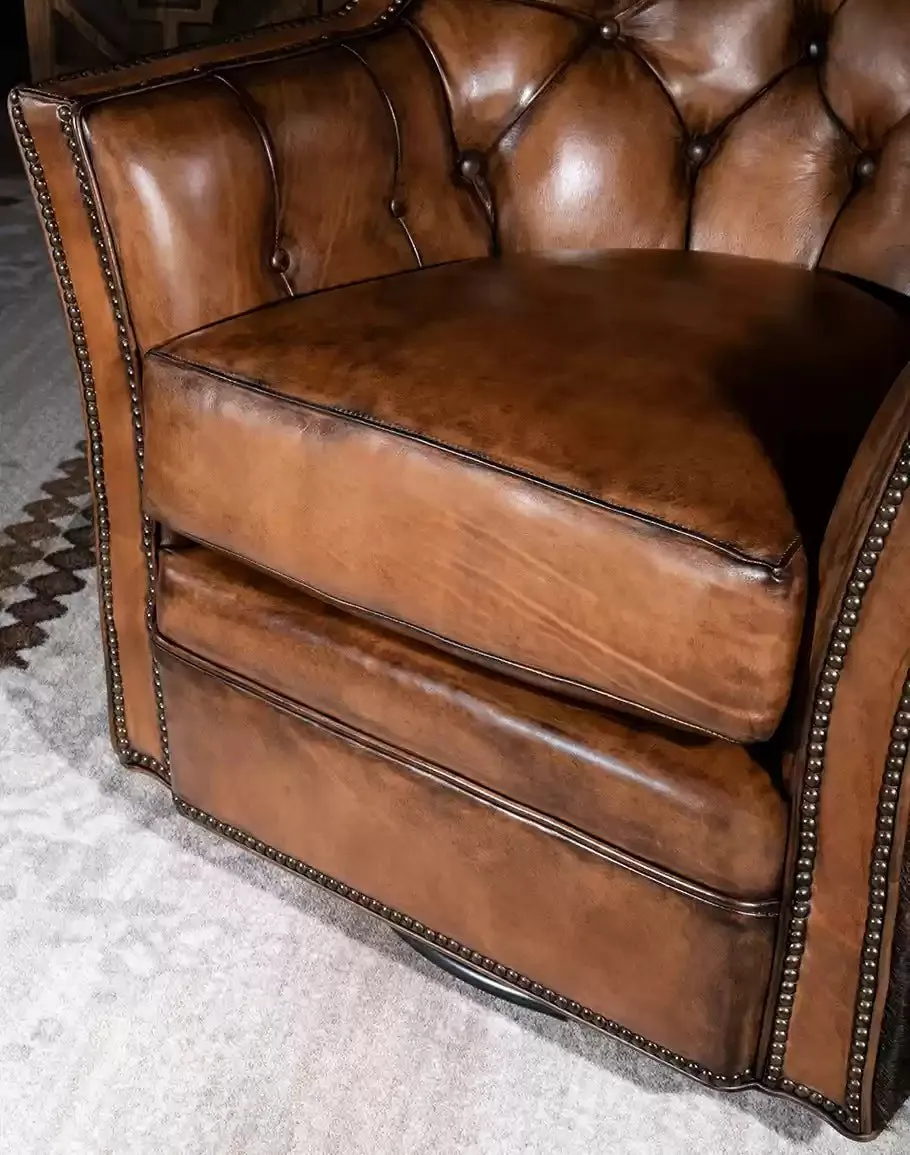Brindle Cowhide & Tufted Leather Swivel Glider