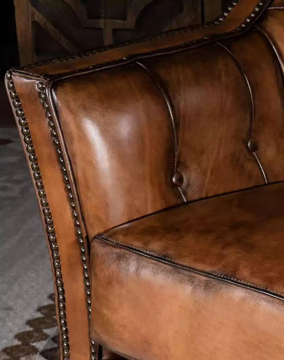 Brindle Cowhide & Tufted Leather Swivel Glider
