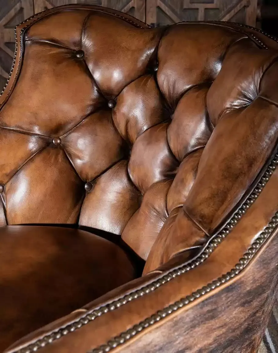 Brindle Cowhide & Tufted Leather Swivel Glider